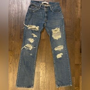 Levi’s 505 straight cut medium wash distressed jeans